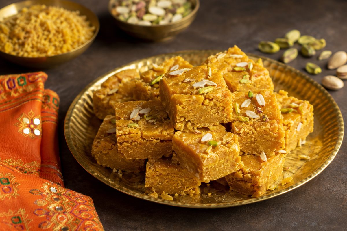 An assortment of Indian mithai including diamond-cut fudge squares